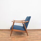 Teak desk and walnut armchair