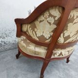 Louis XV shepherdess armchair in carved walnut