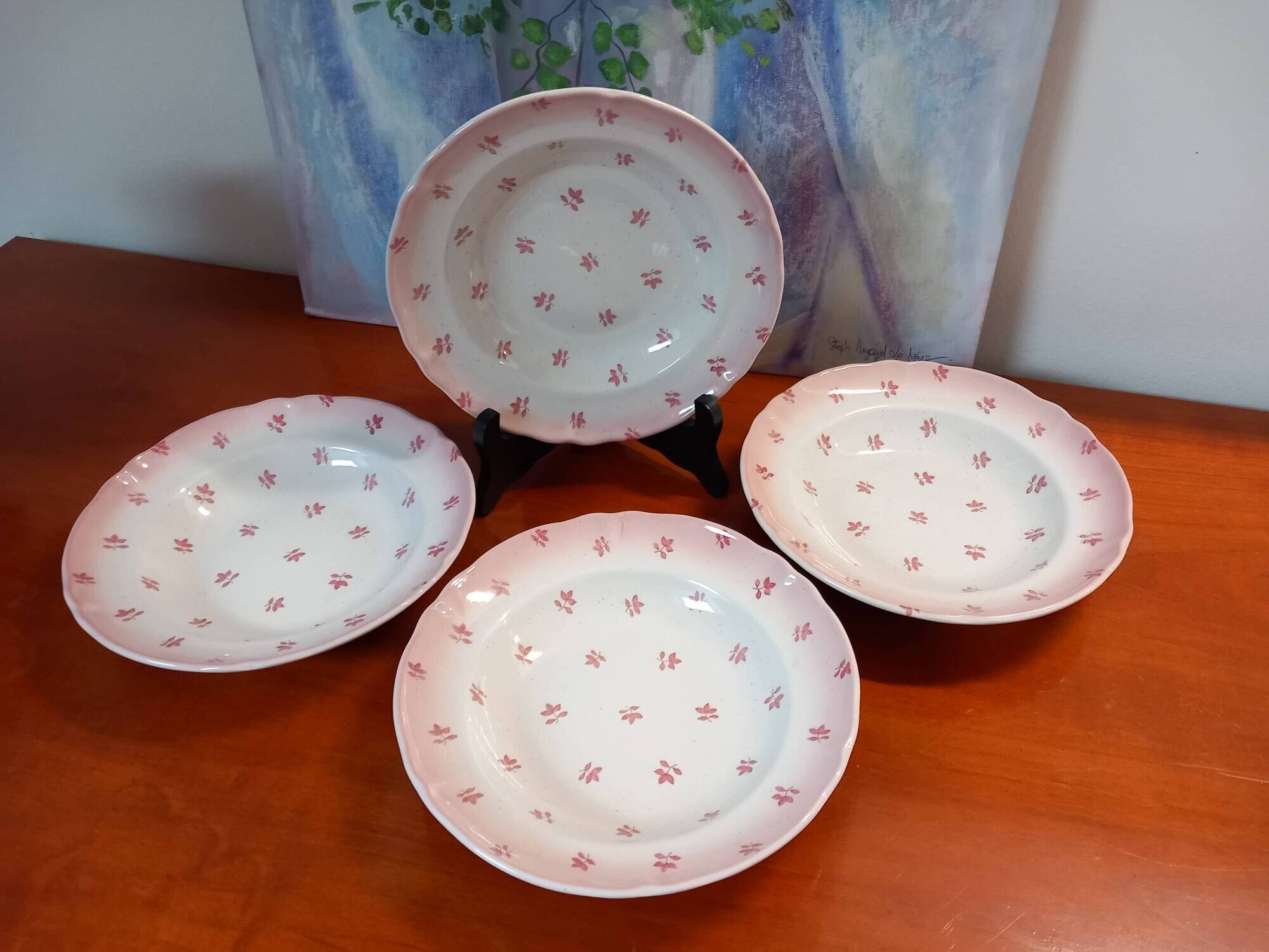 Set of 4 antique deep plates from St Amand in the "Vine Leaves" pattern.
