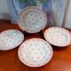Set of 4 antique deep plates from St Amand in the "Vine Leaves" pattern.