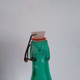 Bottle with green lemonade