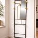 1960s modernist wardrobe. Gold lacquered metal.