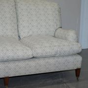 Howard & Sons canapé with feather cushions and ticking fabric, Victorian style.