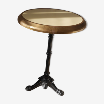 Laminated brass cast iron base bistro table