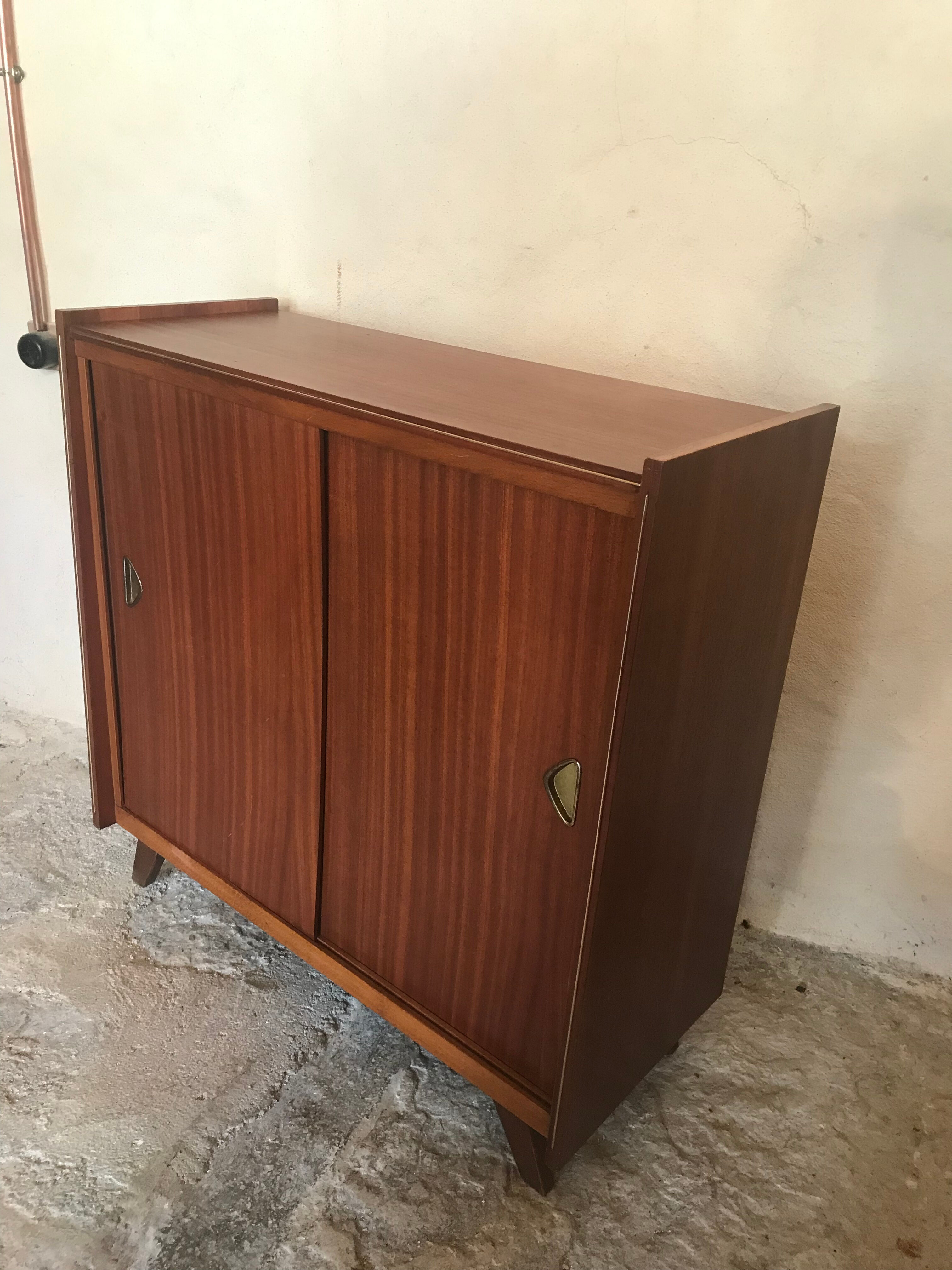 Vintage storage cabinet teak veneer sliding door compass feet