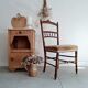 Antique chair turned wood sitting velvet flowers