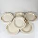 Set of 6 demi-deep plates from Longwy, early 20th century, floral decoration.