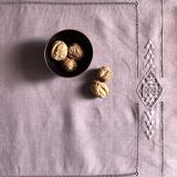 Old linen tablecloth tinted in lilac