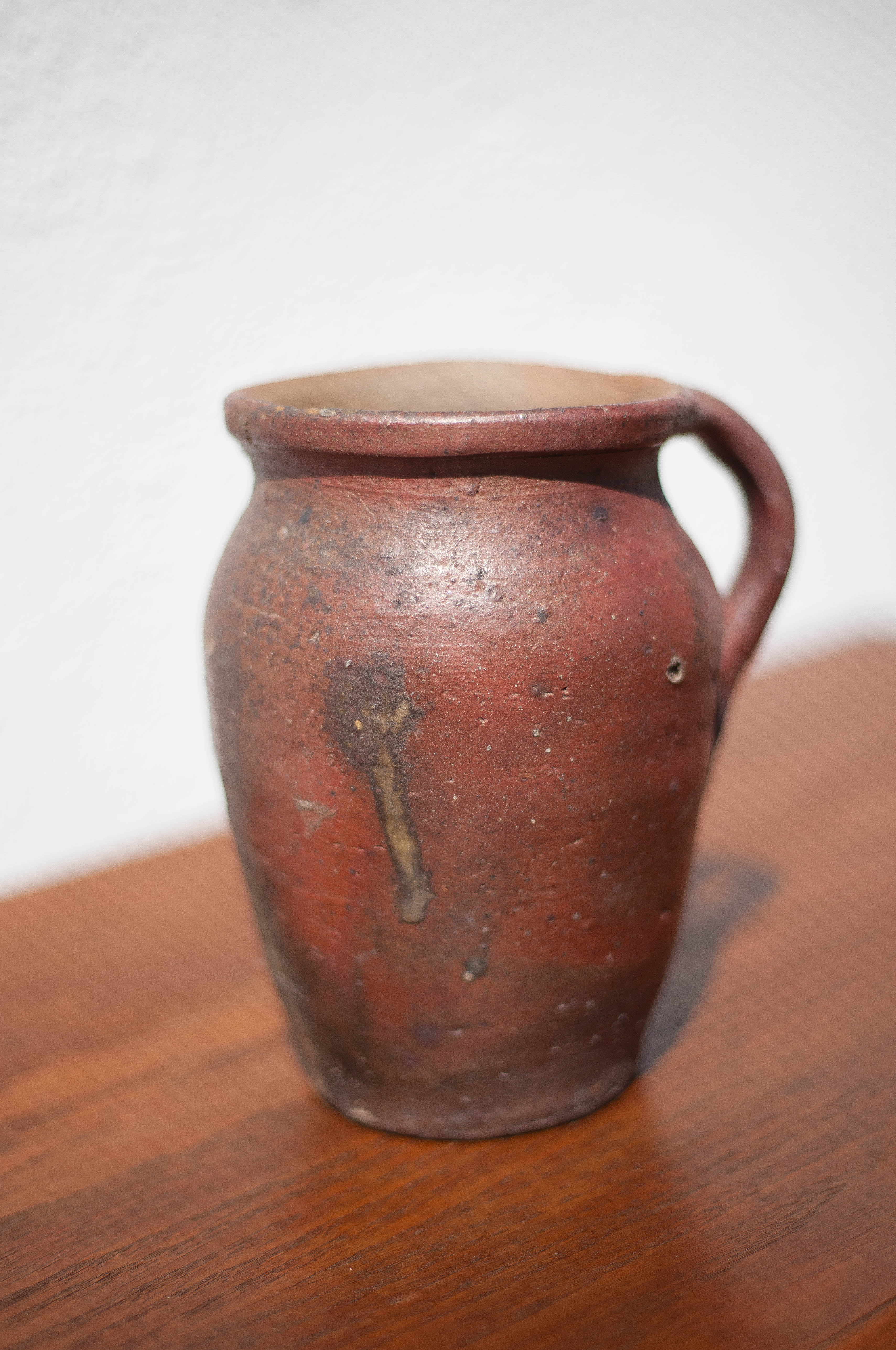 Pot in Norman sandstone of Ger
