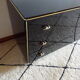 Commode noir laqué, laiton doré