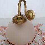 Pink glass wall lamp with garland of pearls
