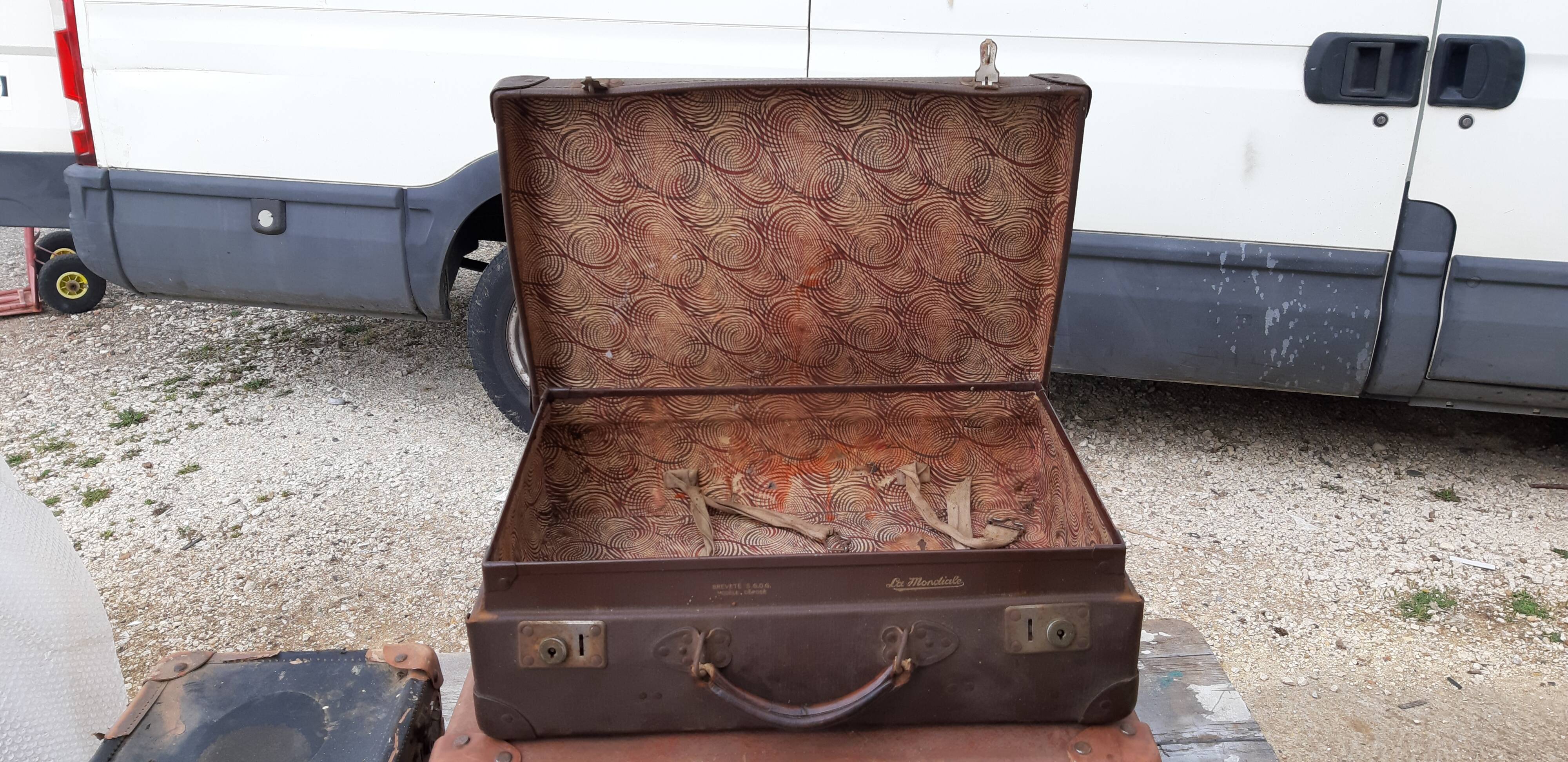 3 vintage suitcases
