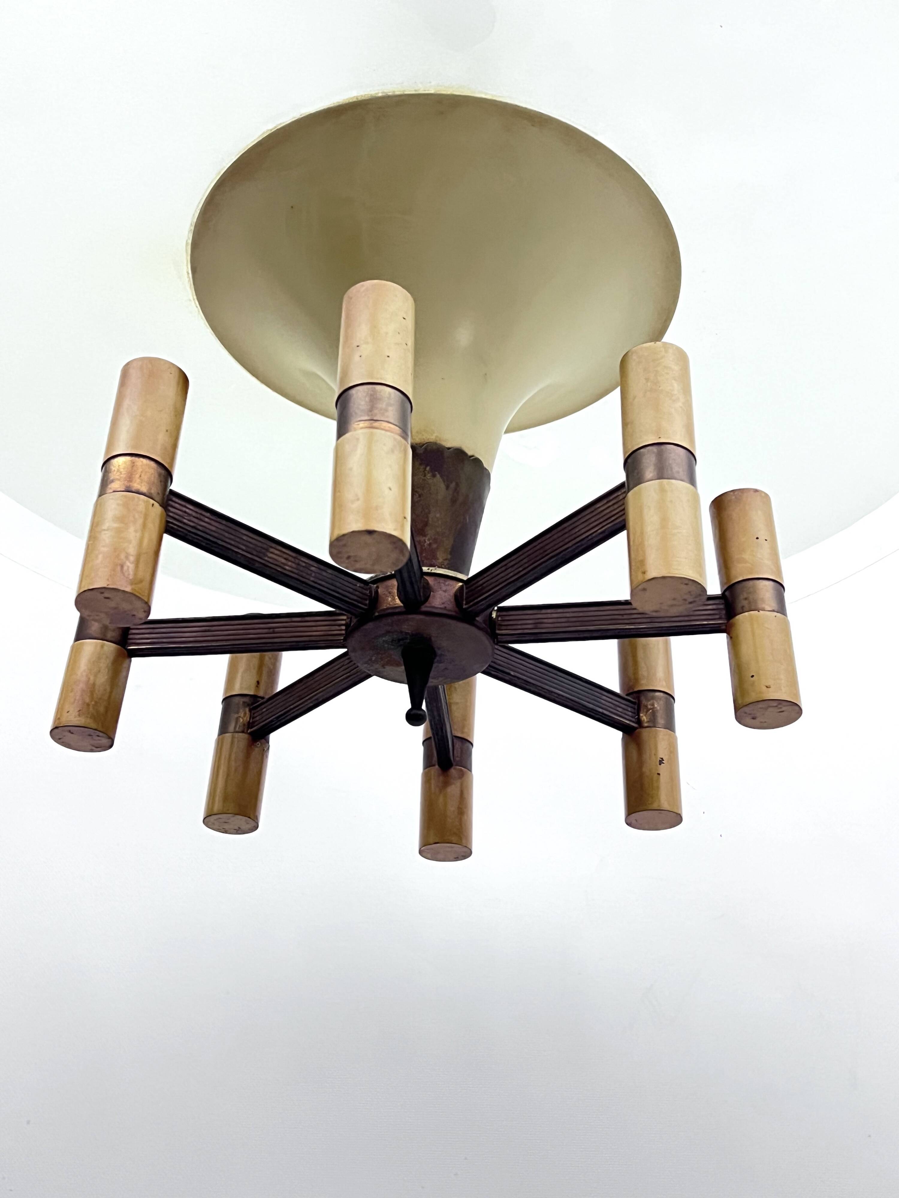 Curved glass disk chandelier. Italy 1950s