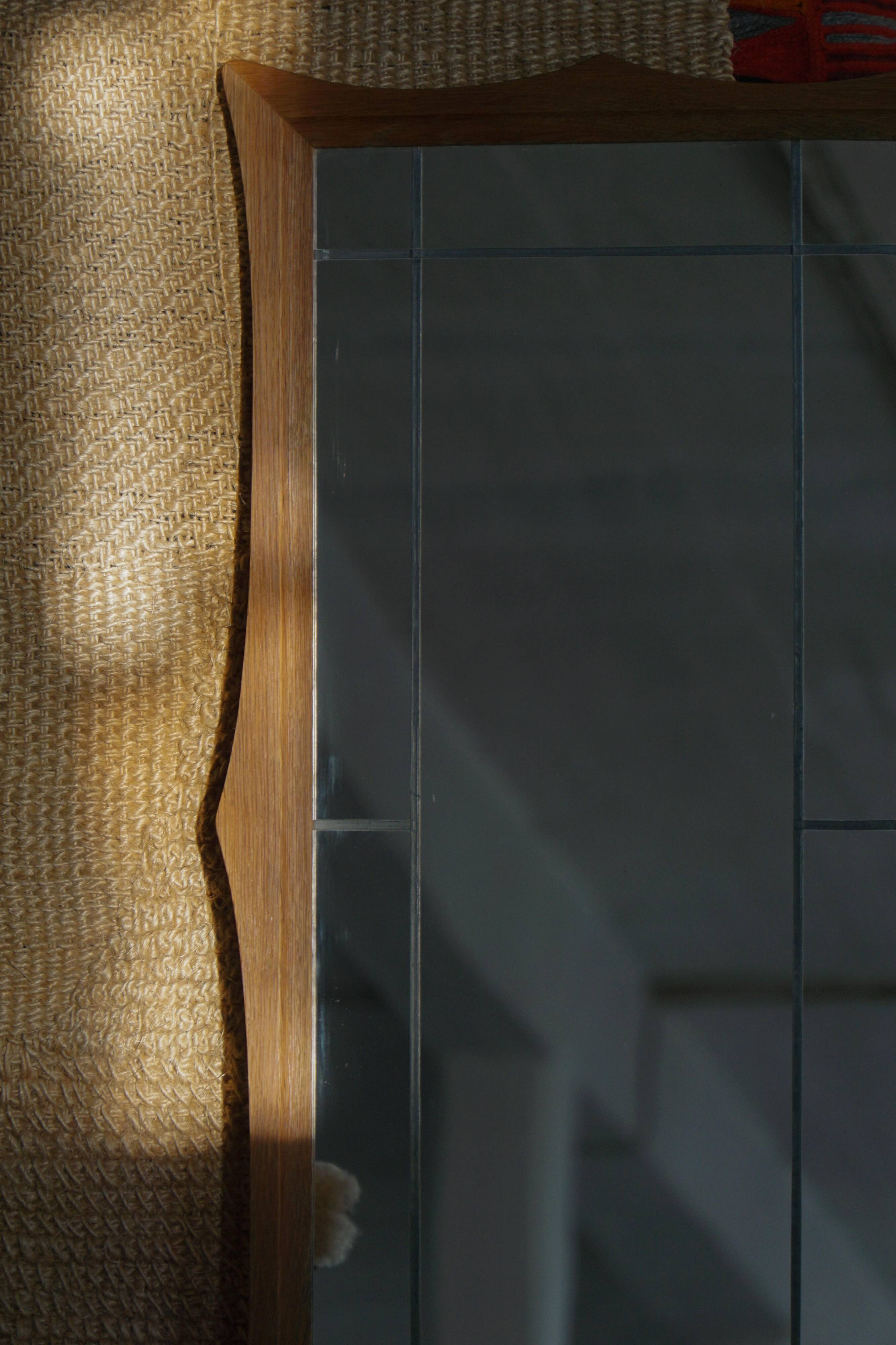Danish wall mirror in solid oak from the mid-20th century, Scandinavian modern design.