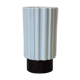 White vase on wooden base