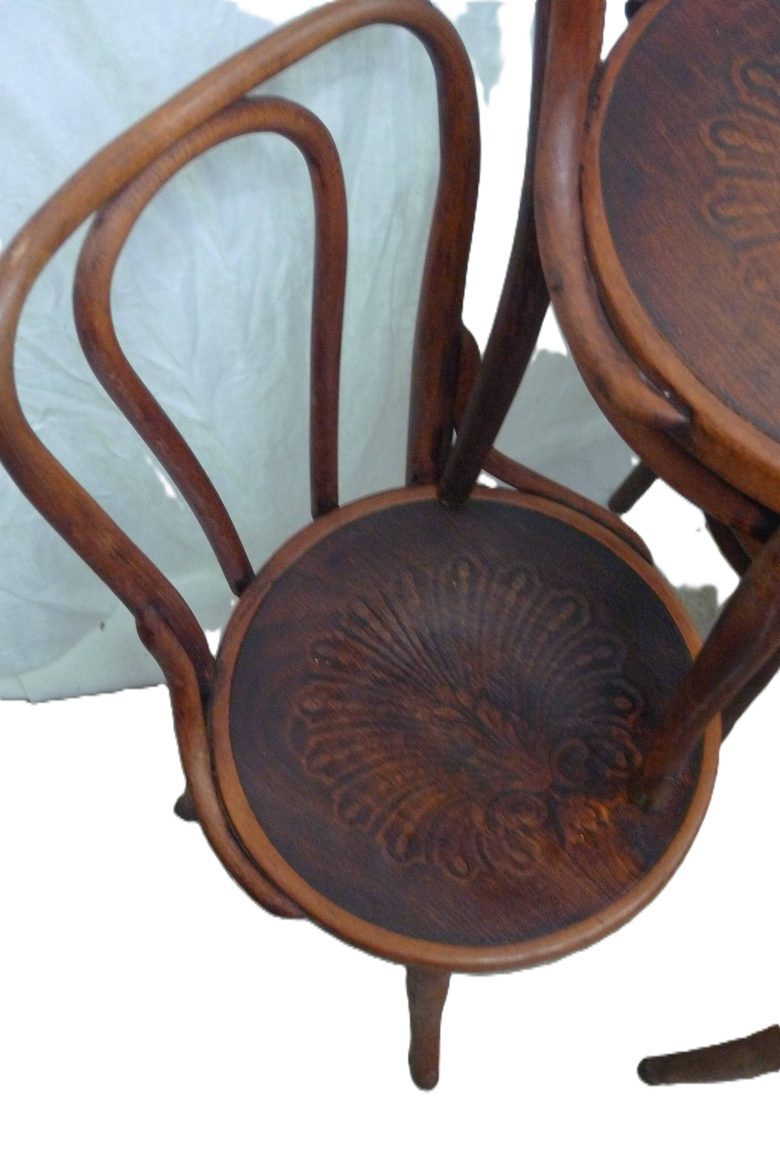 Set of four Jacob Kohn chairs.