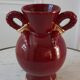 Vase St Clément bordeaux et doré années 50