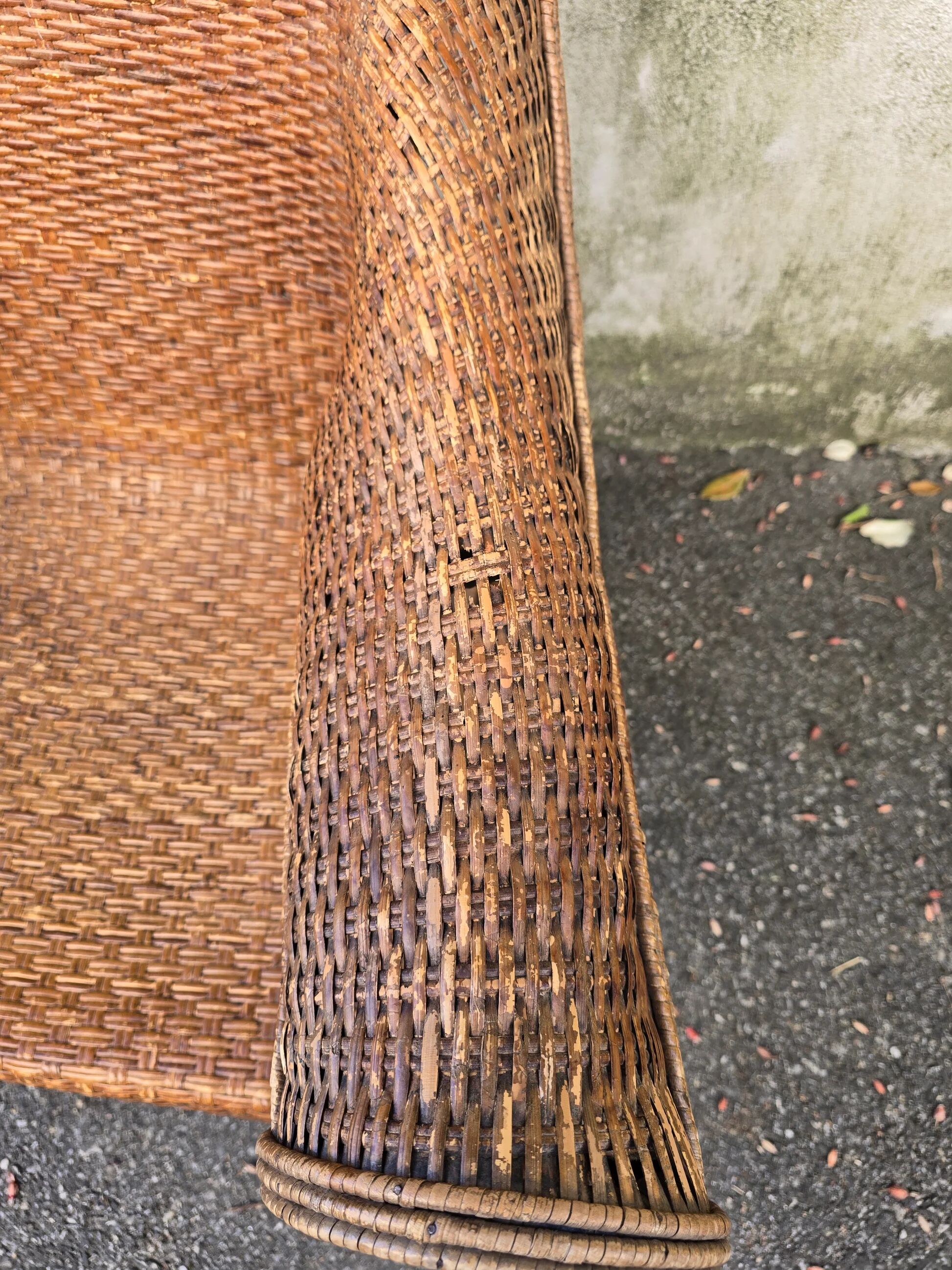 Arts & Crafts armchair in wicker and rattan attributed to Dryad & Co, UK, circa 1920.