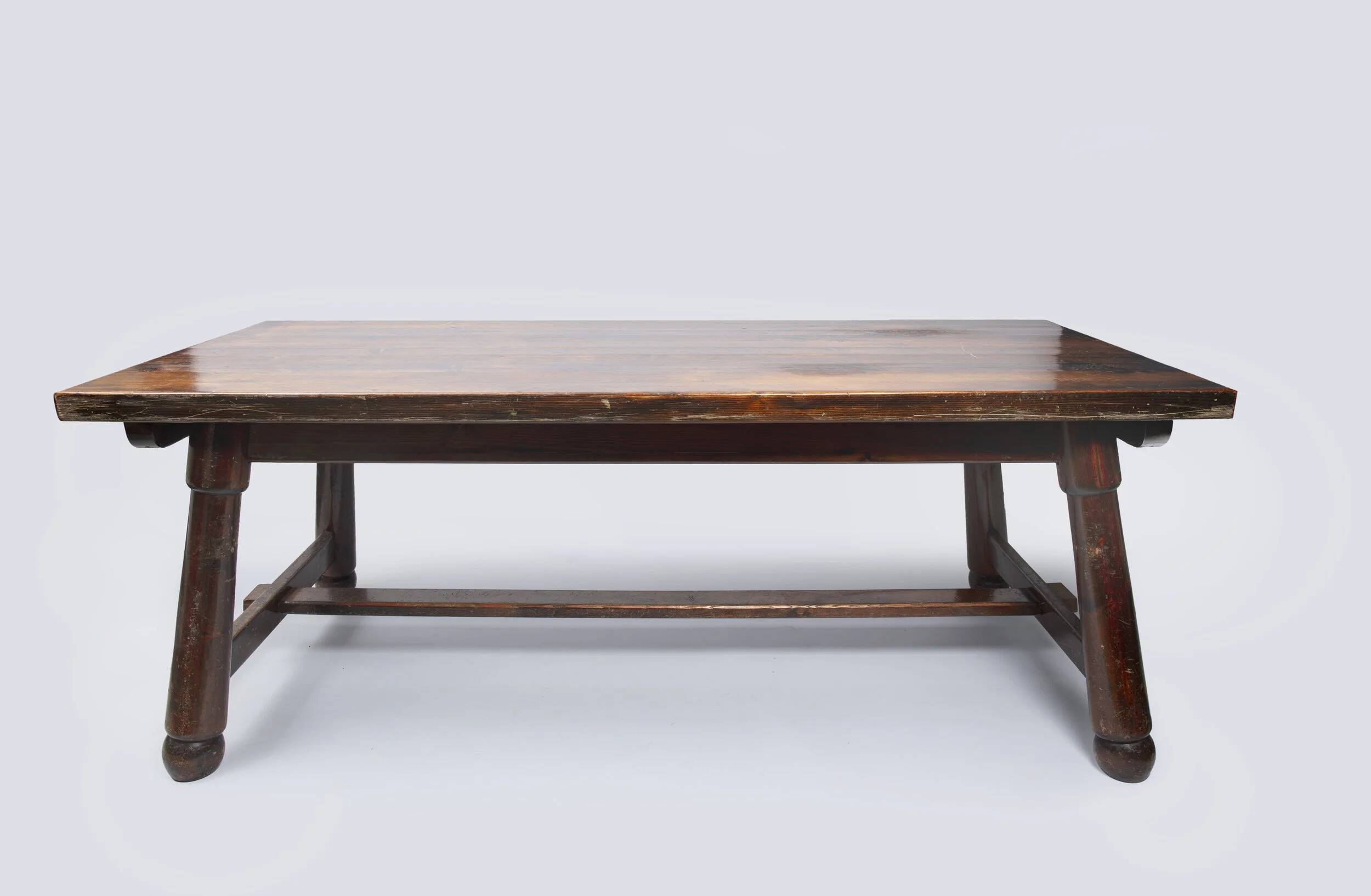 Brutalist table designed by Georges Robert in stained pine. France, 1960.
