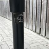 Round dining table by Charles & Ray Eames for Vitra 1980