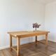 Solid oak farmhouse table with extensions.