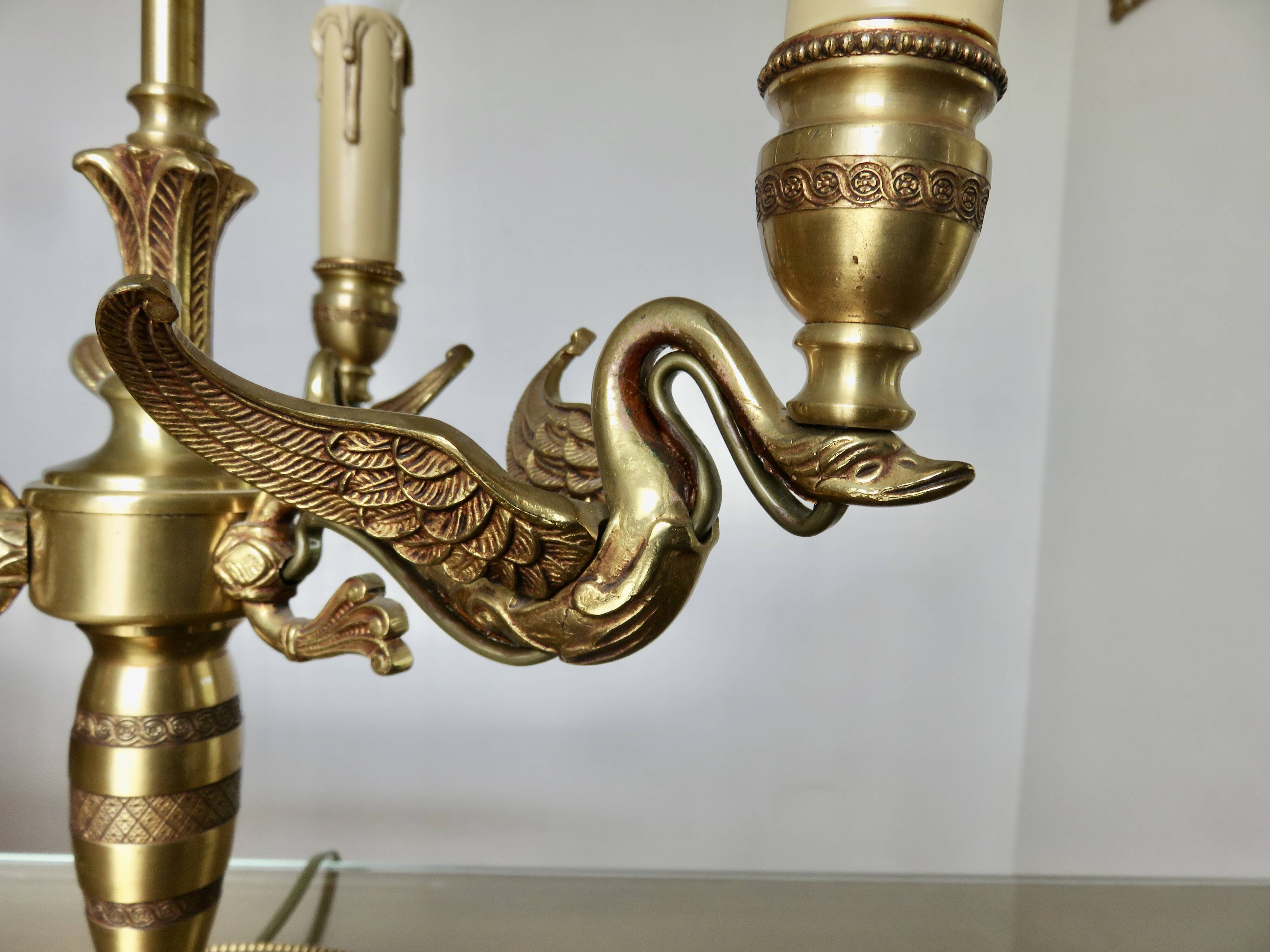 Lucien Gau empire style lamp in solid bronze gilded with bright gold "with swans"