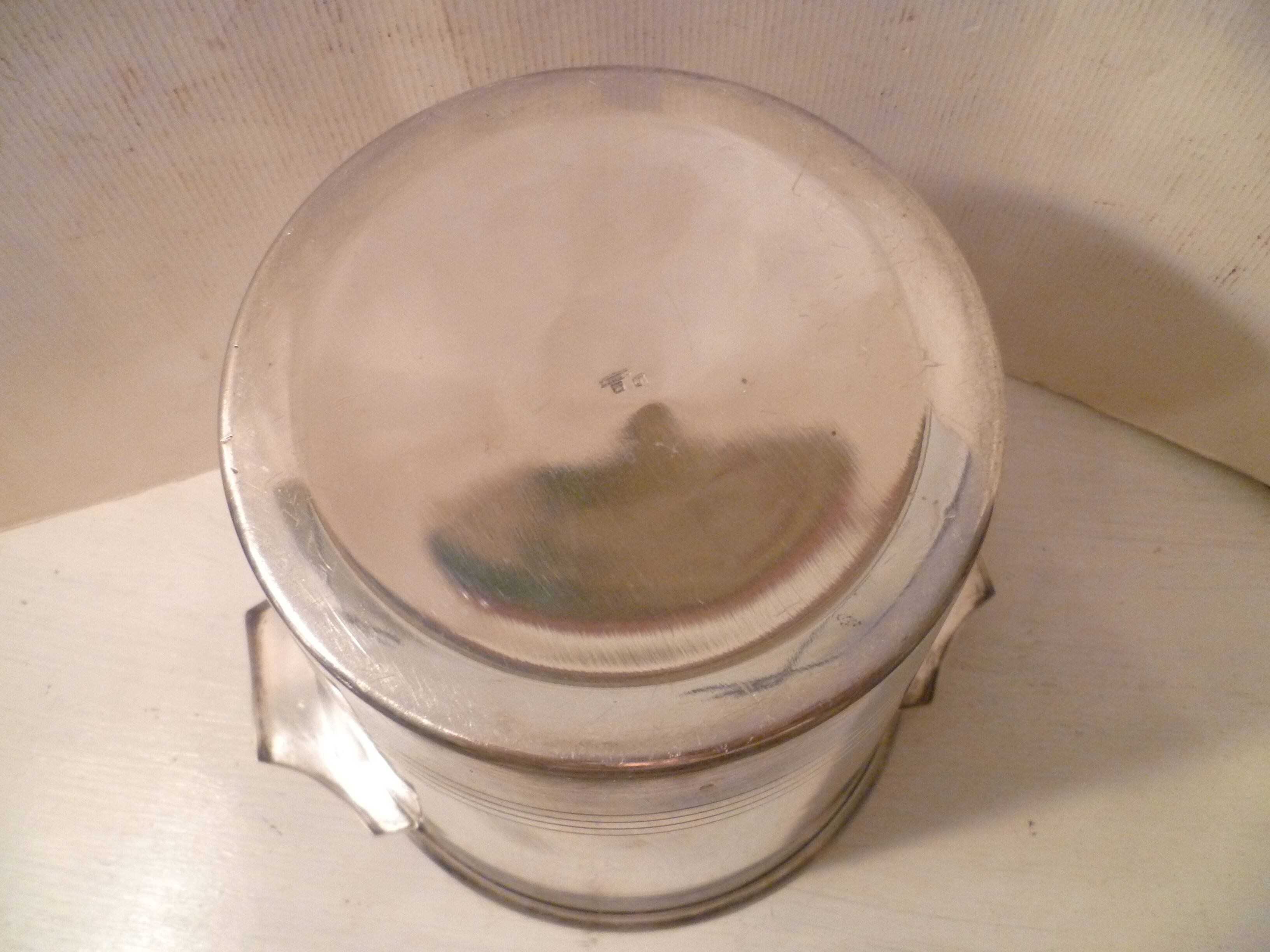 Champagne bucket / Champagne bucket design in silver-plated metal, St Medard.