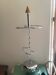 Designer umbrella stand in chrome metal and wood.