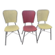 Set of 3 vintage yellow and red faux leather chairs.