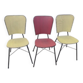 Set of 3 vintage yellow and red faux leather chairs.