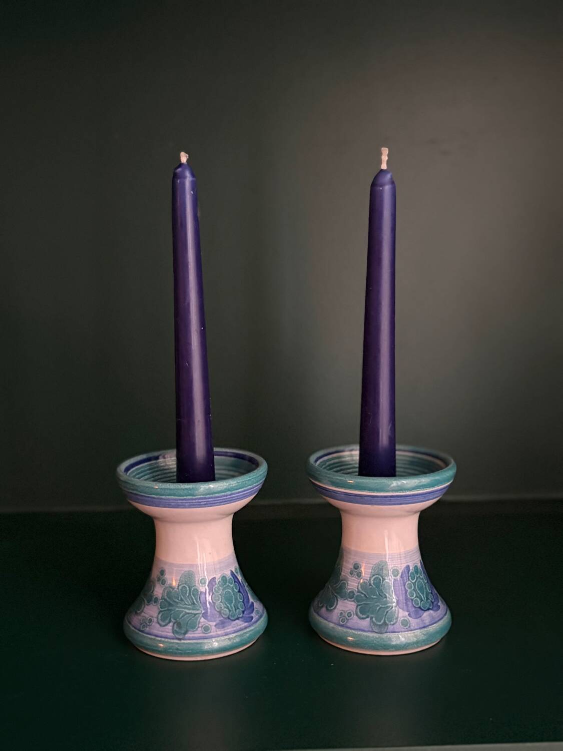 Two ceramic candlesticks