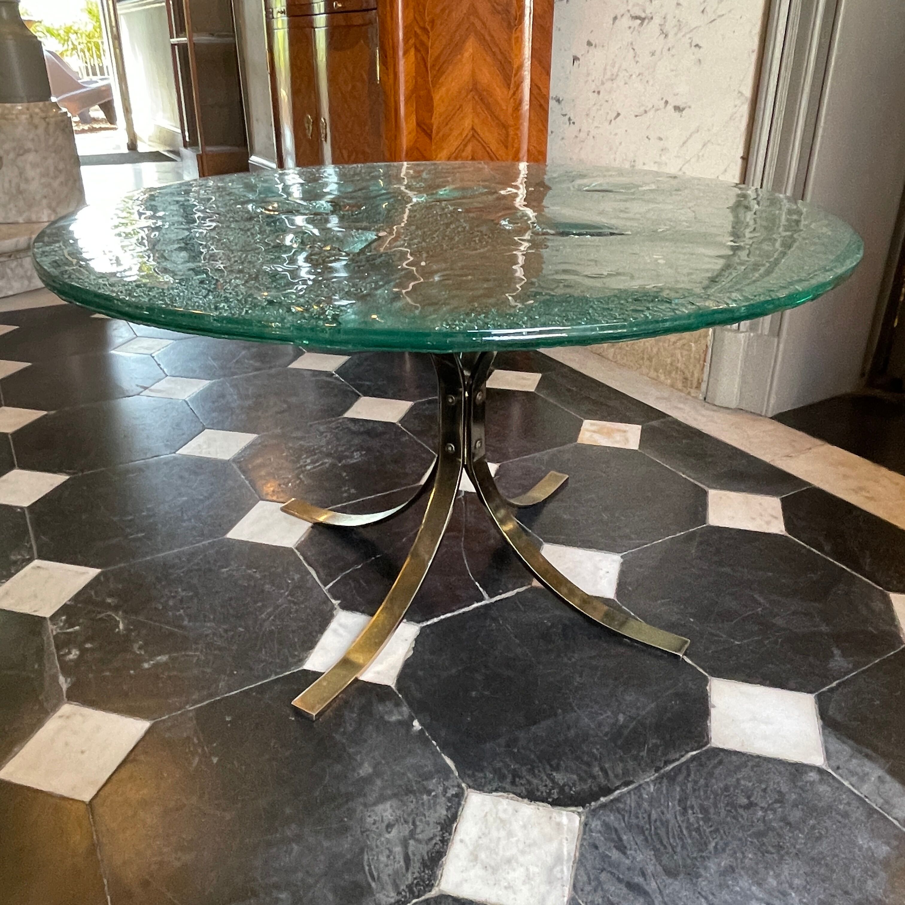 Pair of round coffee tables, glass, ca 1970