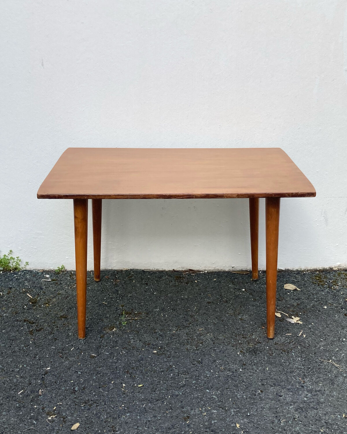 Wooden coffee table with compass leg