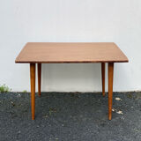 Wooden coffee table with compass leg