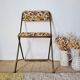 Chaise pliante vintage Lafuma modèle "Chantazur" à motif fleuri