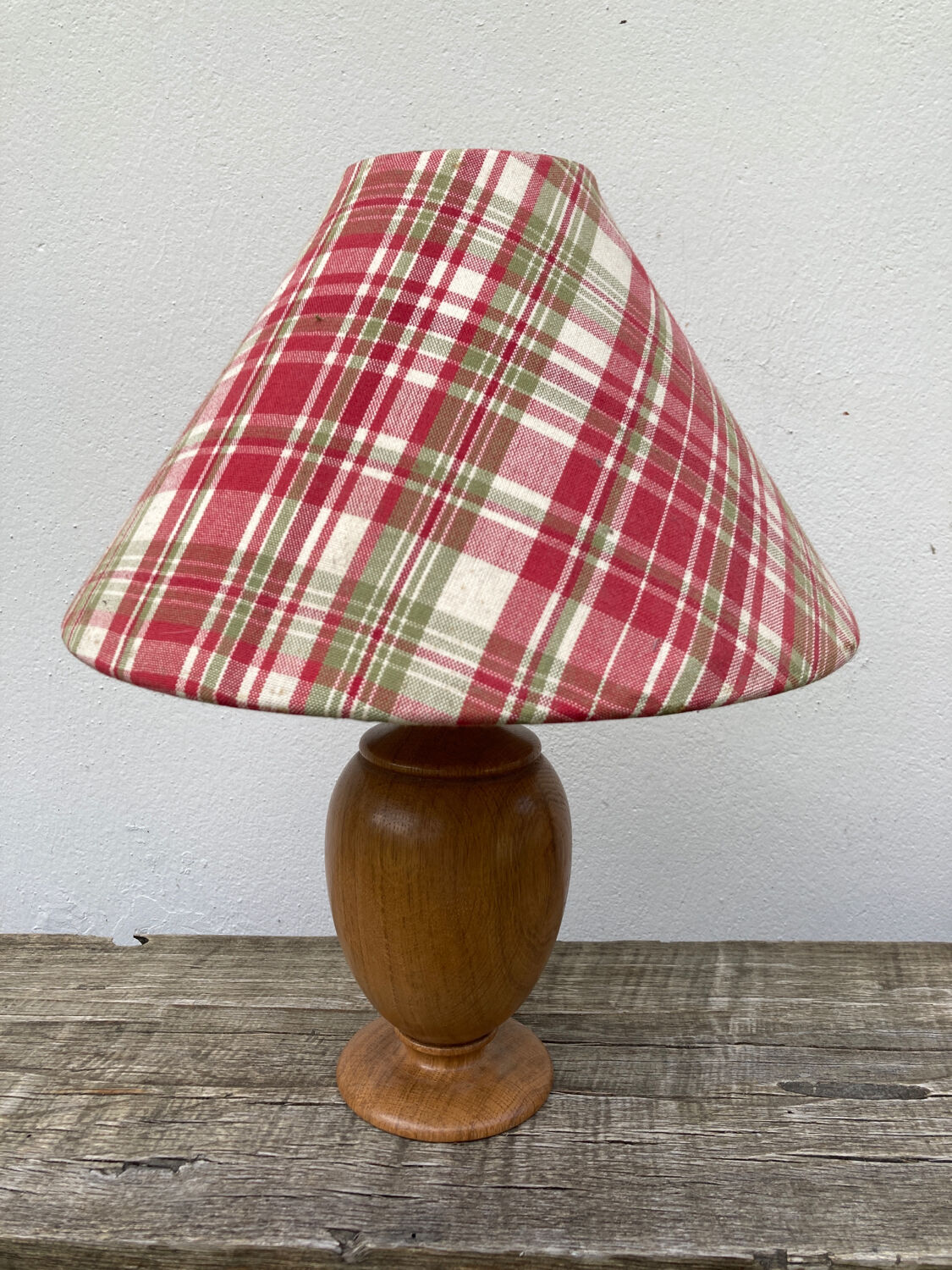 Wooden lamp and vintage red and green striped lampshade