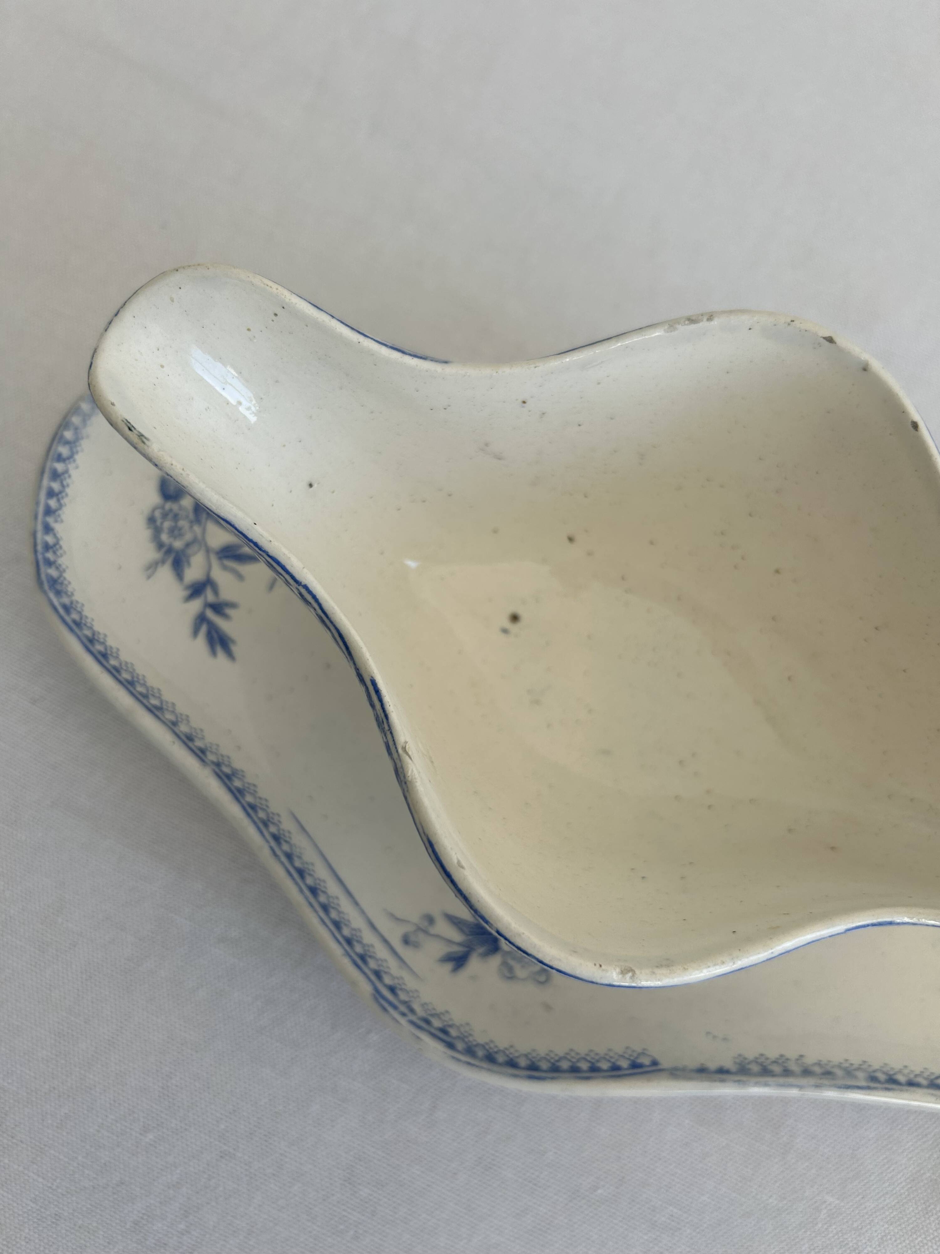 Antique sauce boat in earthenware – Grigny – blue floral decoration