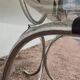 Vintage oval design table in smoked glass and chrome legs
