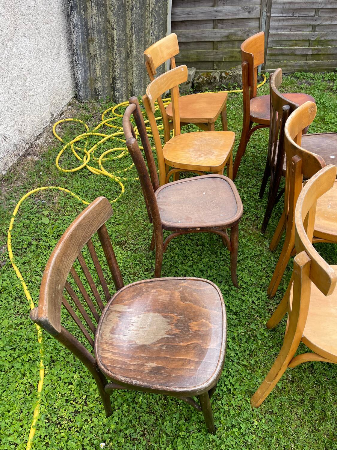 Lot of 16 mismatched bistro chairs