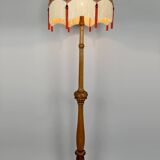 Important Art Deco carved oak floor lamp, France, circa 1920