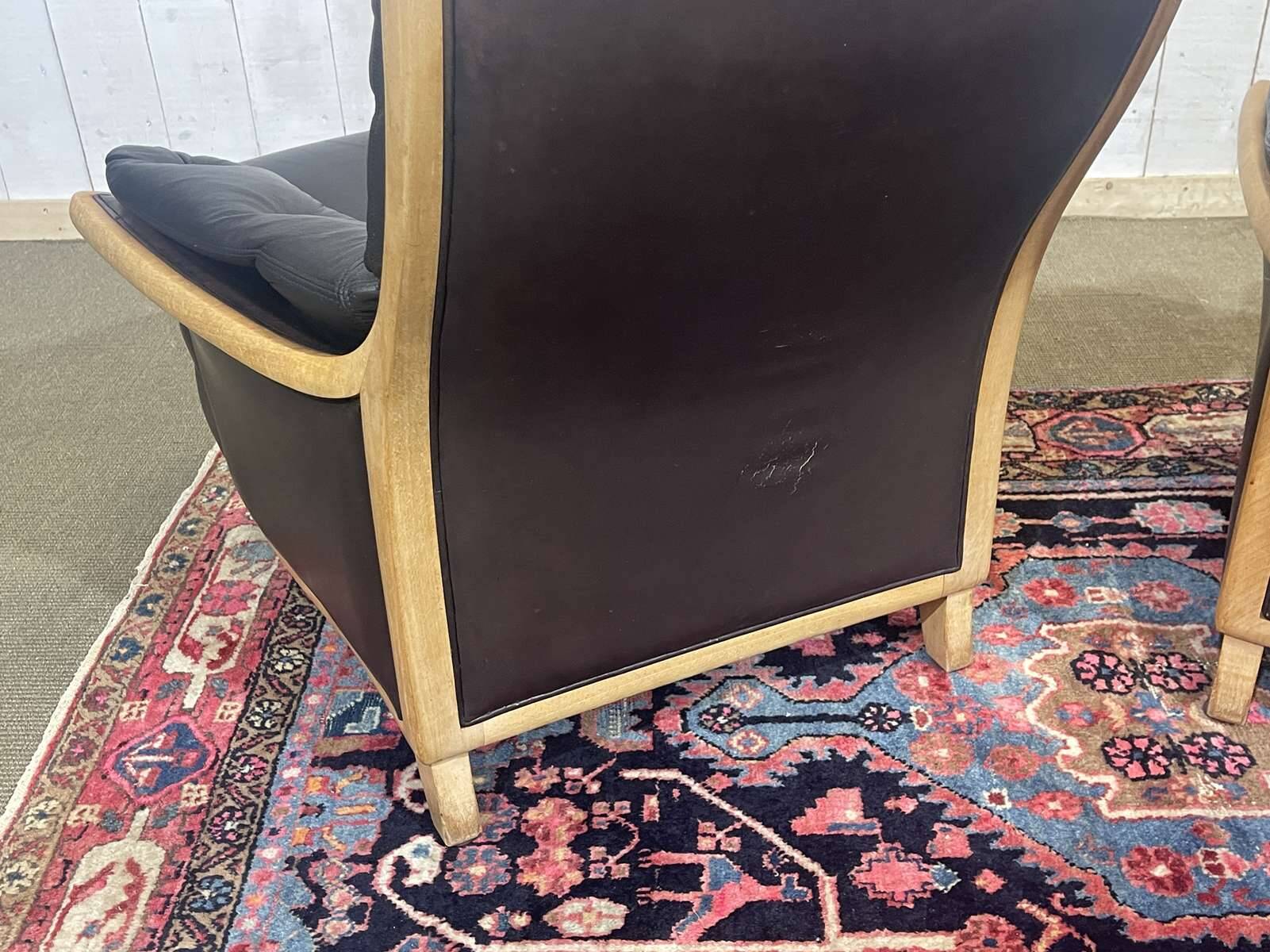 Pair of leather and beech armchairs from the 1970s.