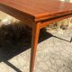 Extendable dining table with vintage 60s teak extensions
