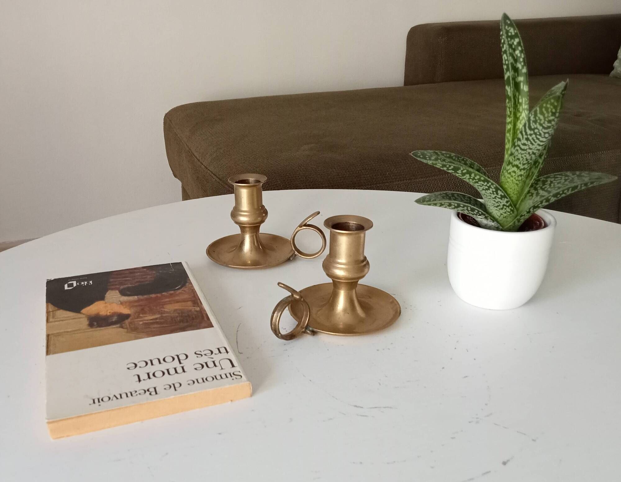 Antique hand candlestick in solid gilded brass.
