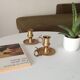 Antique hand candlestick in solid gilded brass.
