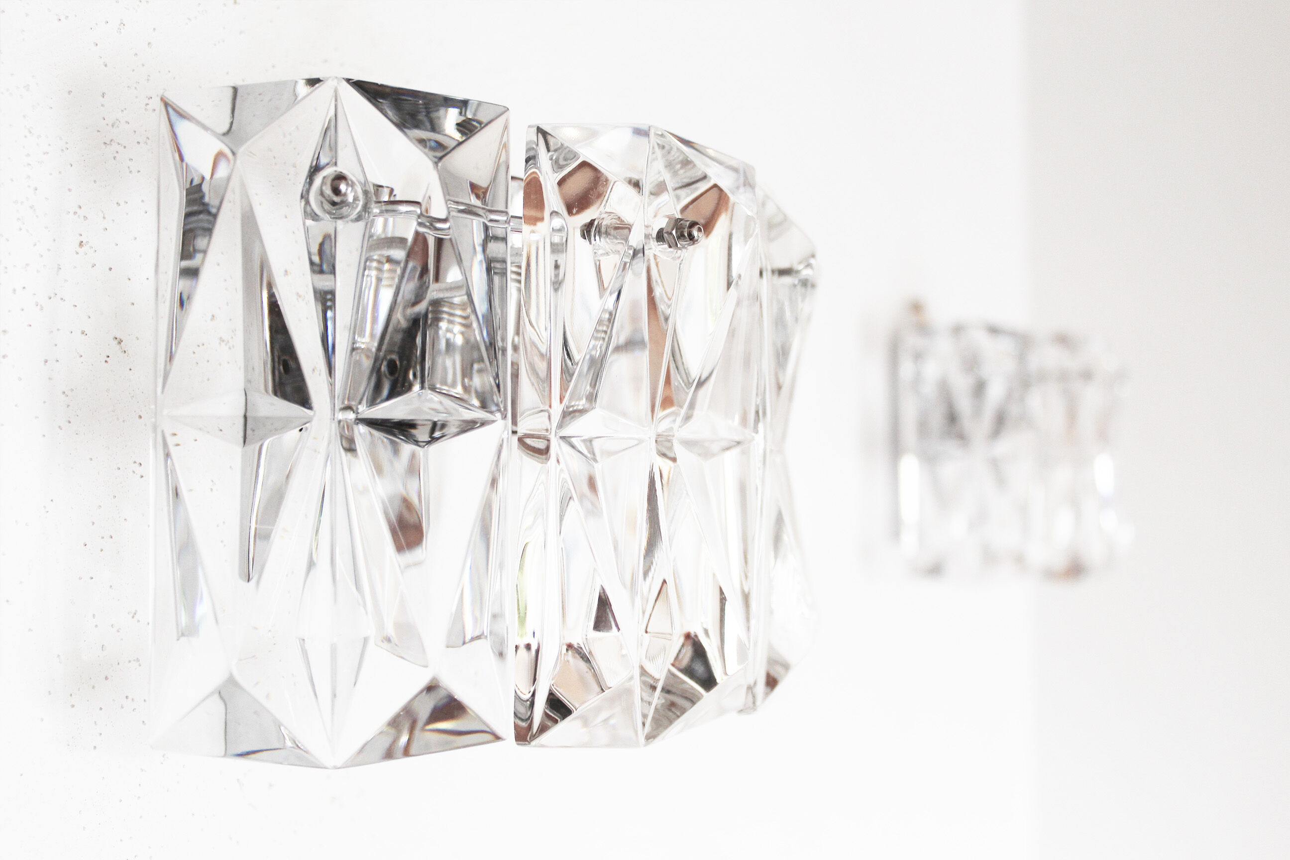 Set of two polished metal sconces by Kinkeldey