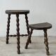Two French farmhouse stools made of turned wood.