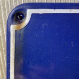 Enameled sheet metal street sign