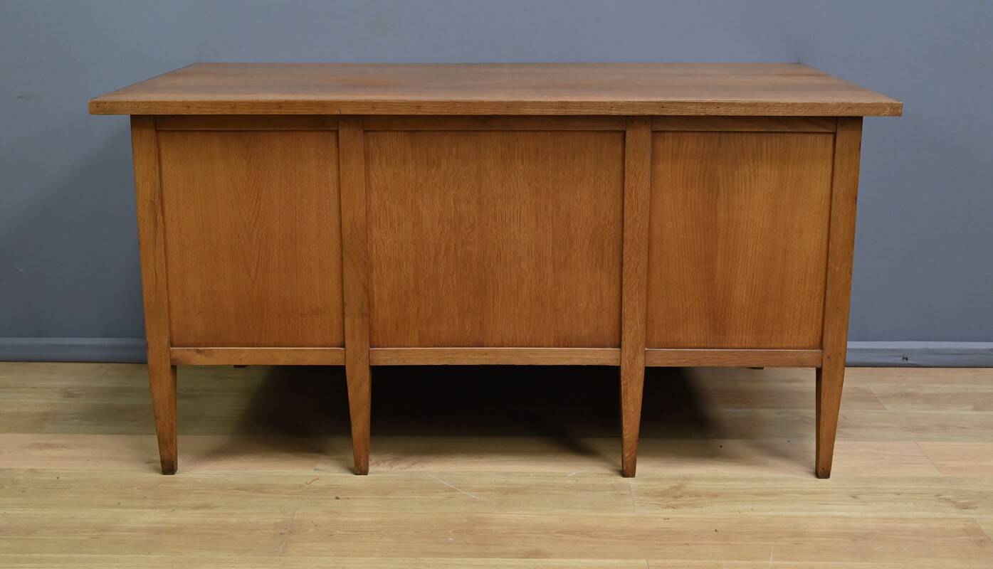Solid oak pedestal desk, Régy establishments – 1940