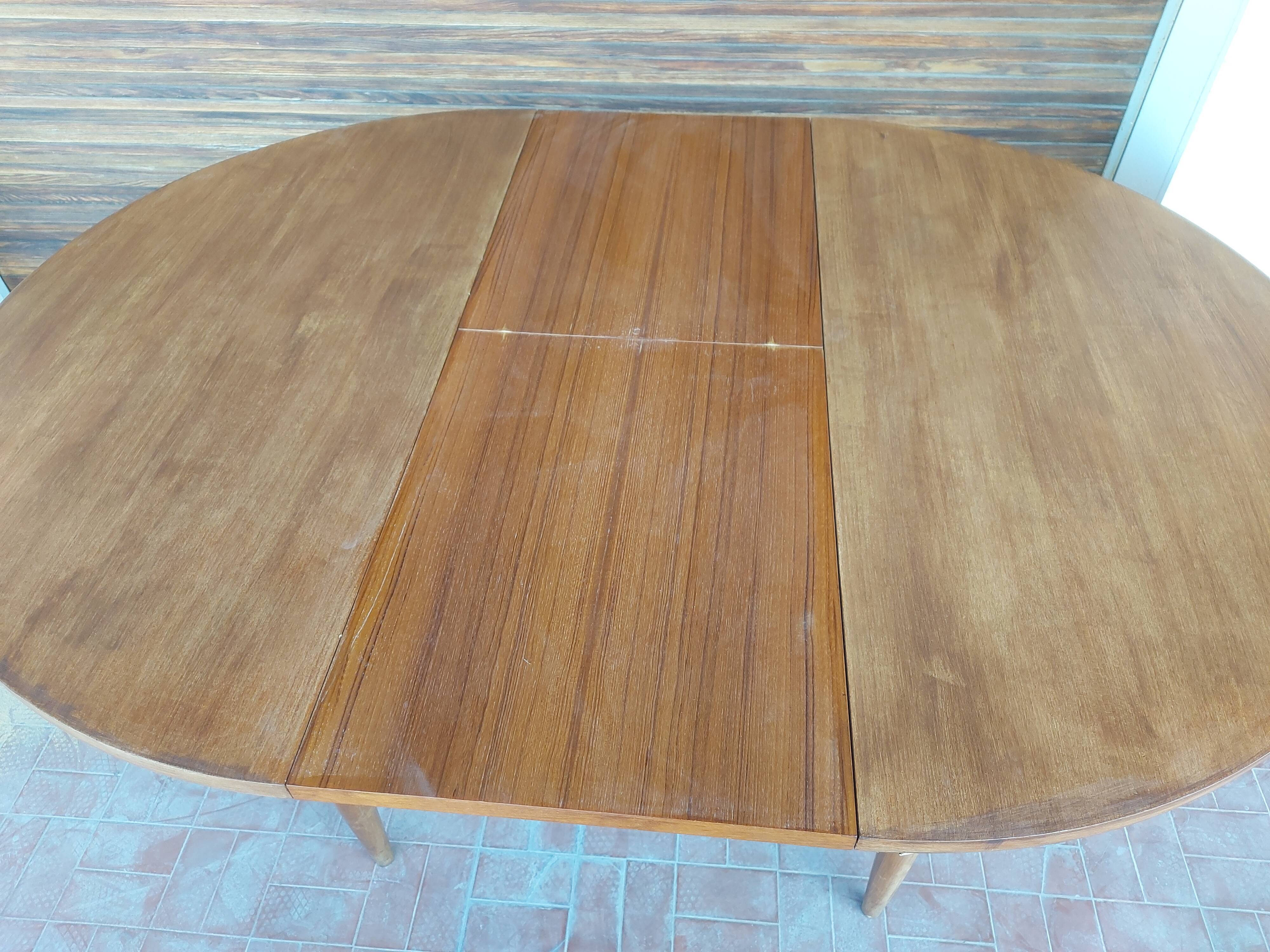 Scandinavian design teak table with extension cord