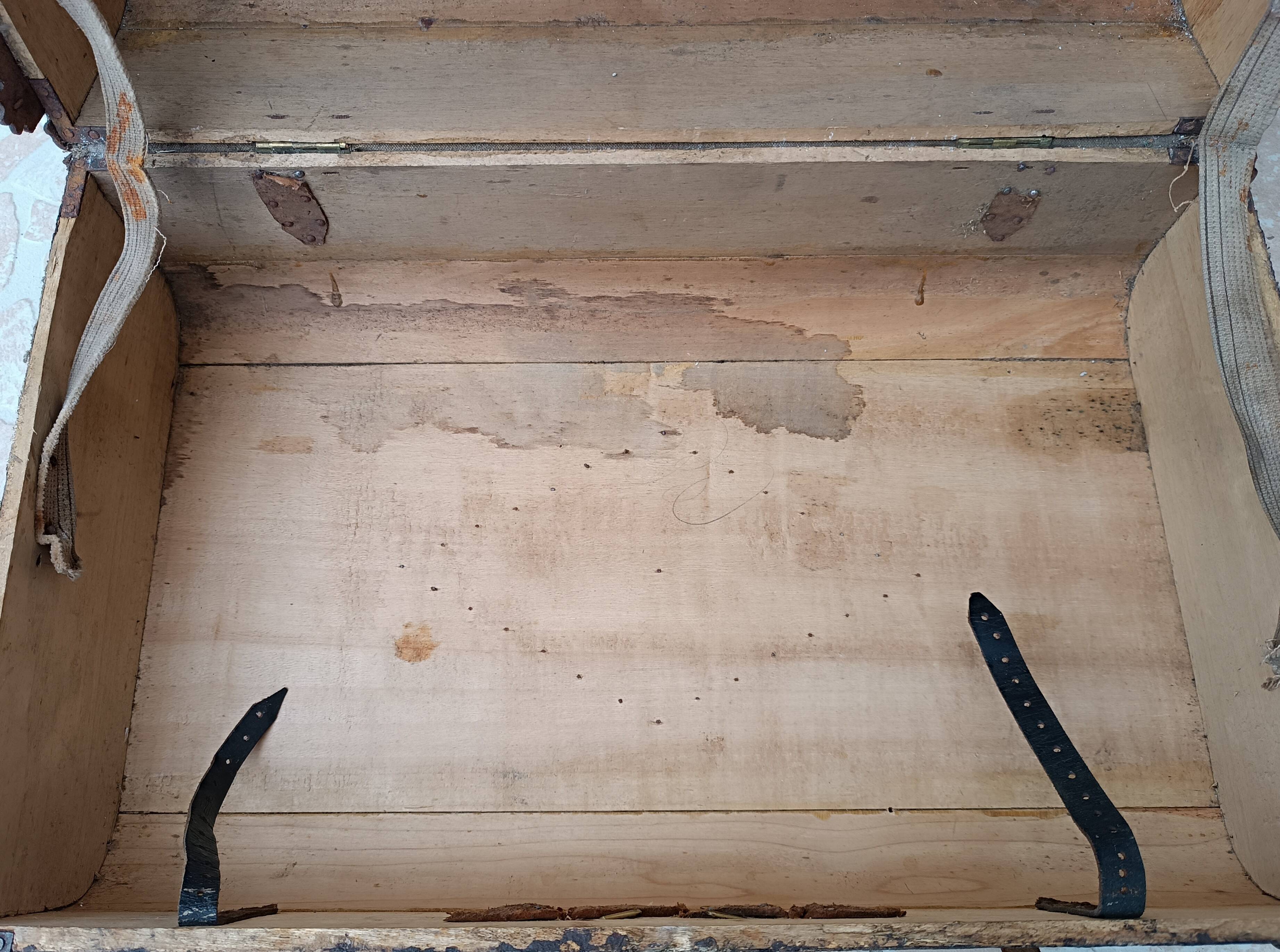 Antique wooden and leather travel trunk